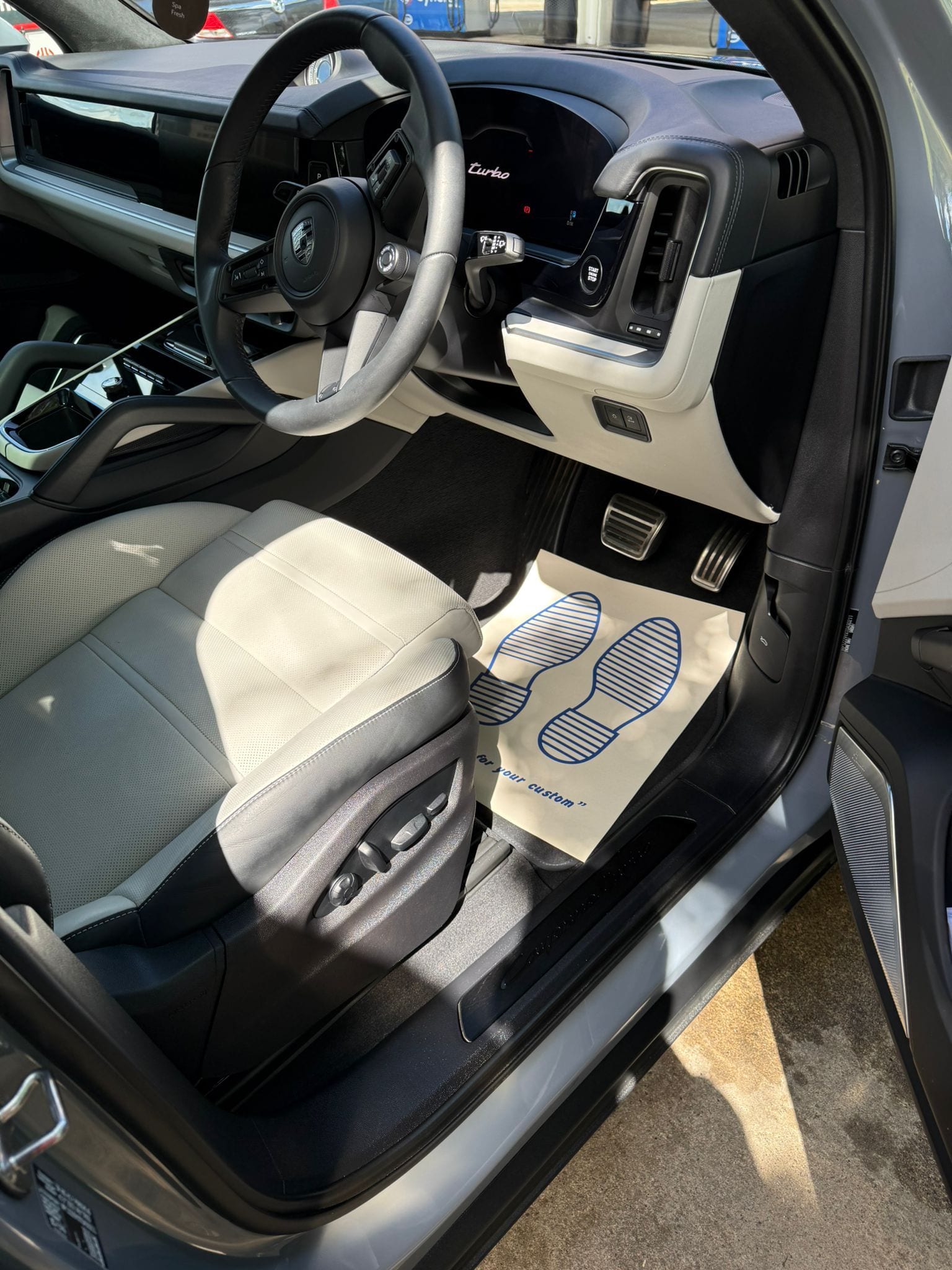 Spotless Porsche interior with cream leather seats